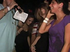 A Few Slutty Chicks Flash Their Butts In A Club In Voyeur Video